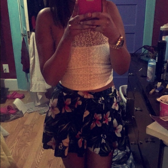 Laced white halter top and silky floral shorts