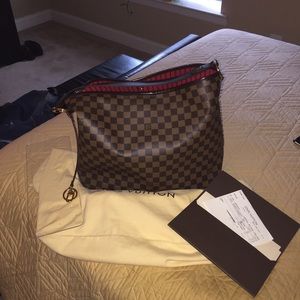 SOLD - Authentic and like new Louis Vuitton Delig