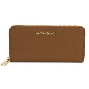 MK continental zip around wallet in luggage color