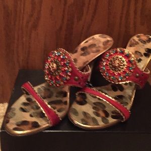 Jeweled leopard and red mules