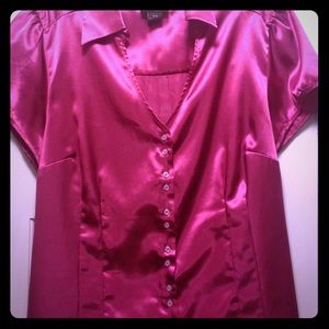 Metallic pink blouse.