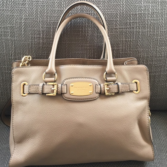 Medium sized tan Michael Kors purse