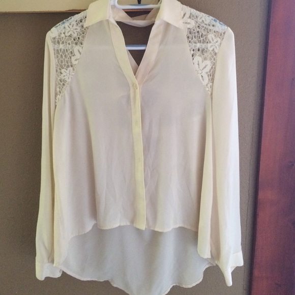 Cream lace blouse barely worn size large.