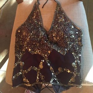 Chocolate and gold lace up back halter.