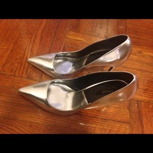 New Silver pointed  high heel shoes.