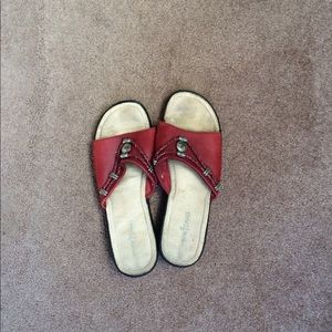 Gently used red leather Minnetonka moccasins