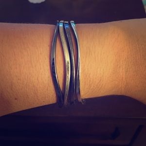 Gold & silver colored curves bangles