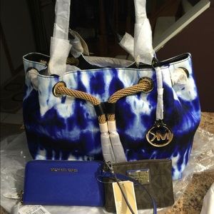 Mk bag  price includes bag and wristlet