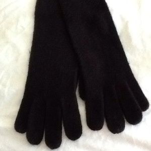 Black soft above elbow gloves.