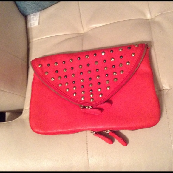 Orange studded clutch