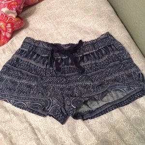 Patterned drawstring shorts.