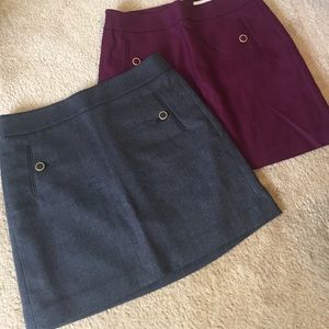 2 skirts with button detail. Gray and cranberry