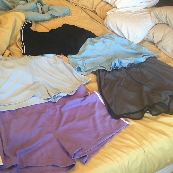 All different brands.   Pants - 5 pair of women's athletic shorts.