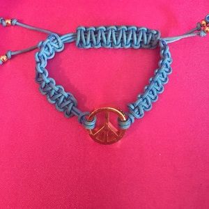 Juicy draw string peace sign bracelet