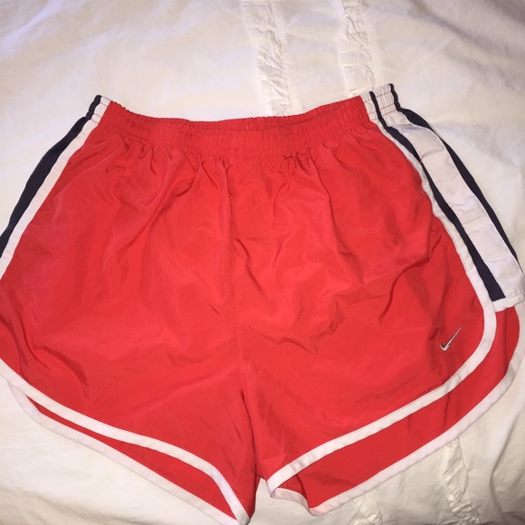 women's M orange and navy Nike shorts