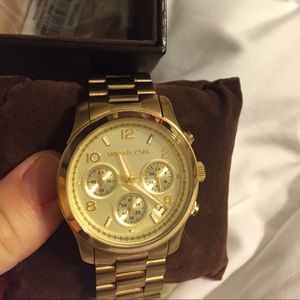 Gold Michael Kors watch -needs battery