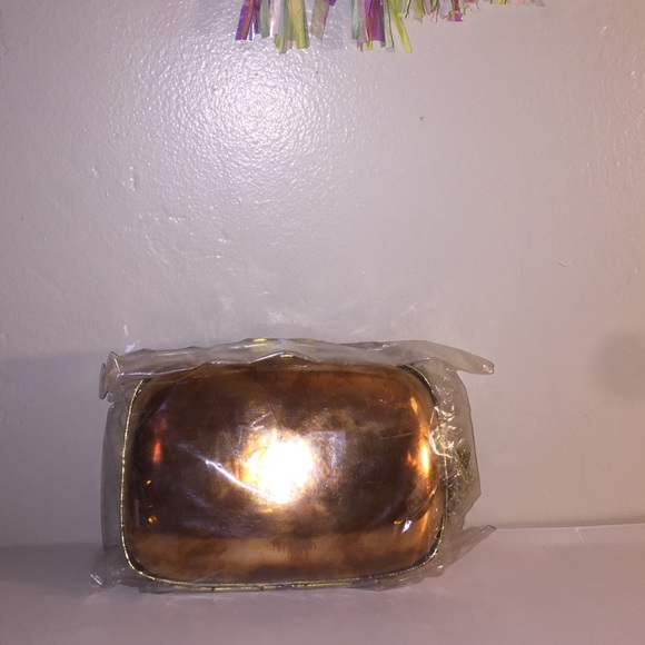 Urban Outfitters bronze metal clutch