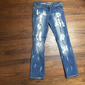 Bleached and distressed skinny jeans