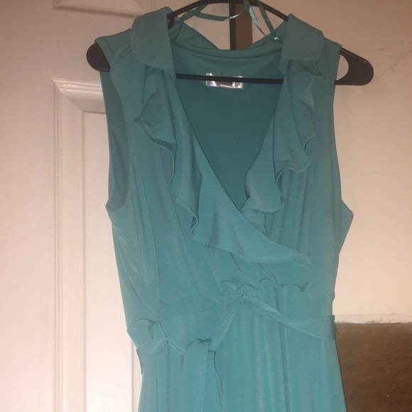 Teal sleeveless dress.