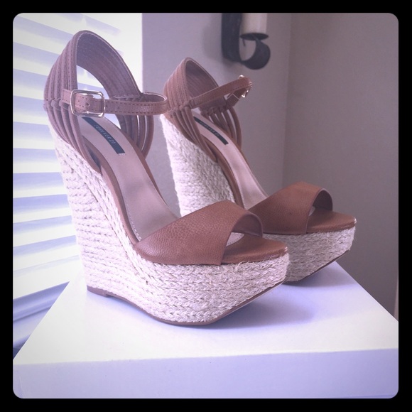 Brand-new never worn camel colored wedges.