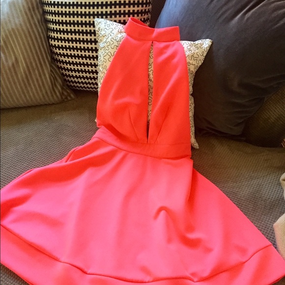 Flirty halter cut-out coral skater dress