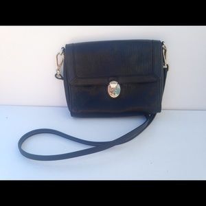 TUMI Carlos Falchi Black Leather Clutch