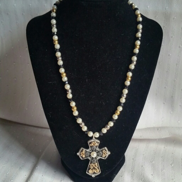 Gold, nickle, black crystal cross.