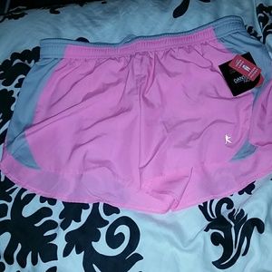 two pairs of pink running shorts