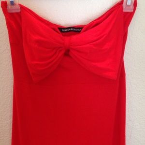 Red strapless maxi dress with bow