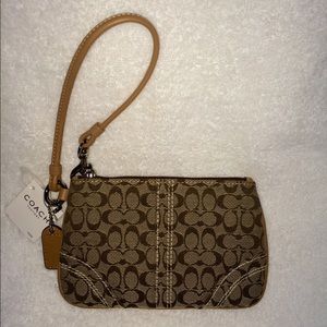 Brand new COACH wristlet