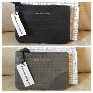 4 @oliviadkteaux: 2 Comme des Garçons wallets
