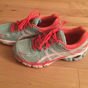 Baby blue and electric orange asics