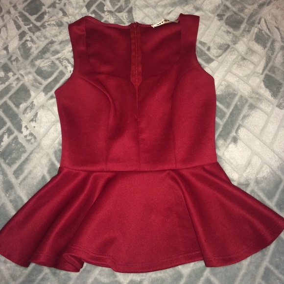 Wine red scuba material low cut peplum top. XS