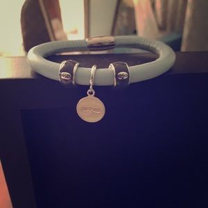 Endless bracelet with three charms
