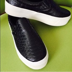 Black snake slip ons reposhing bc they don't fit