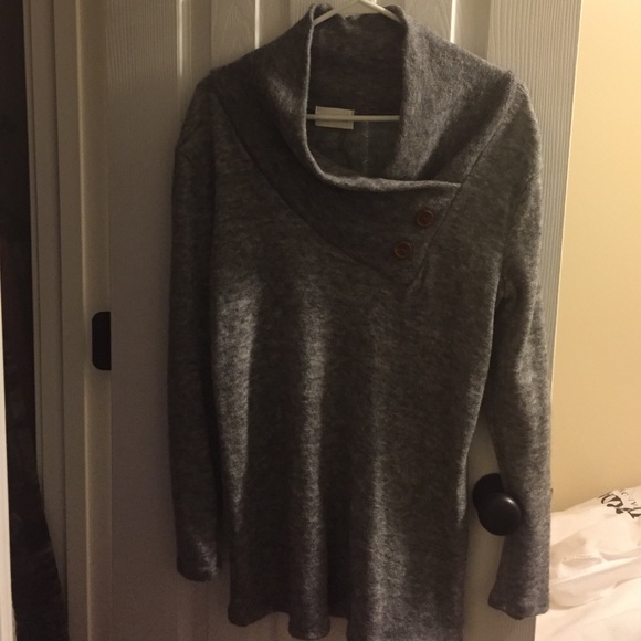 Gray sweater with button detail around neck