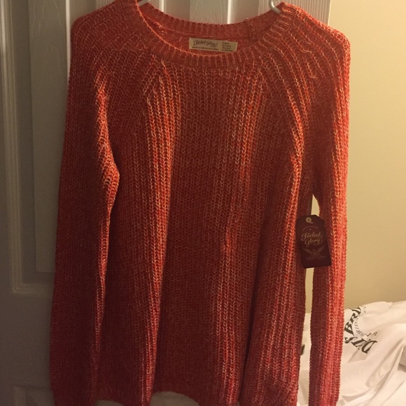Orange knit sweater