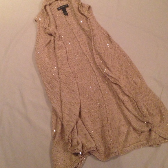 New long gold vest sweater.