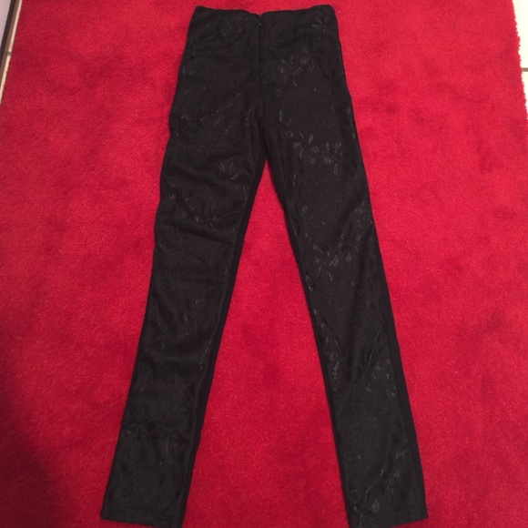 All black reversible solid and lace pants