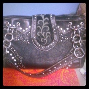 Cute western handbag . Real leather .