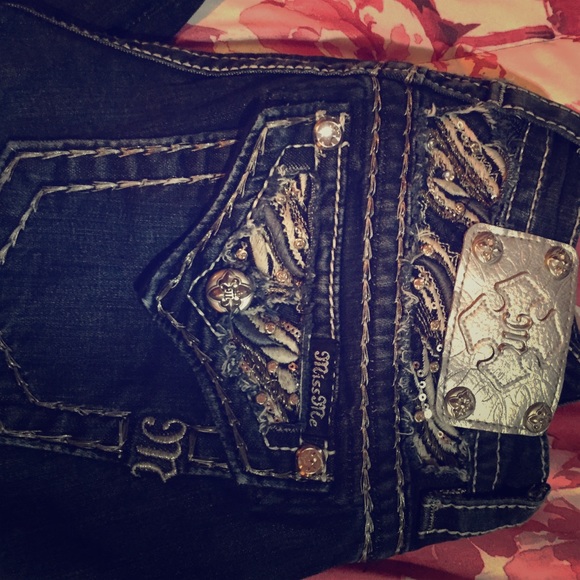 Dark wash miss me denim