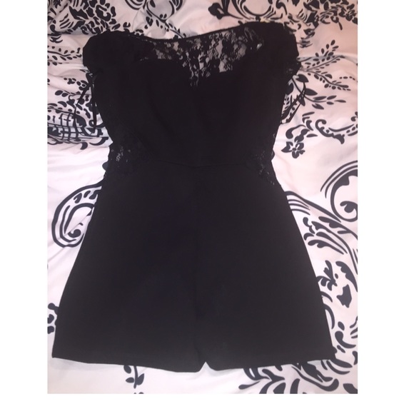 Adorable black and lace  shorts romper size XS