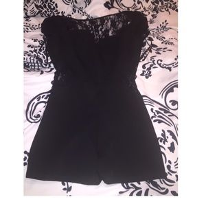 Adorable black and lace  shorts romper size XS