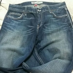 Buckle distressed jeans