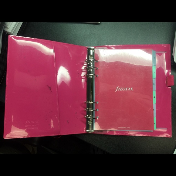 Filofax agenda / planner, needs to be wiped down.