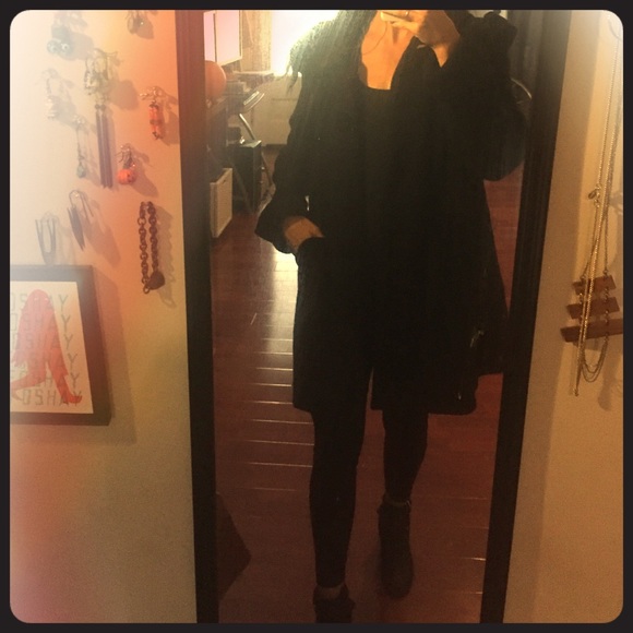 Black coat by Erin Fetherstone with heart pockets