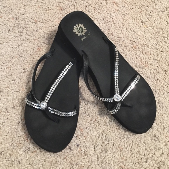 Yellow box flip flops