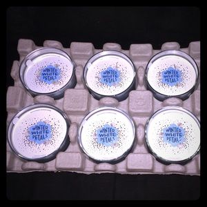 6 Winter White Petal candles from bath and body.