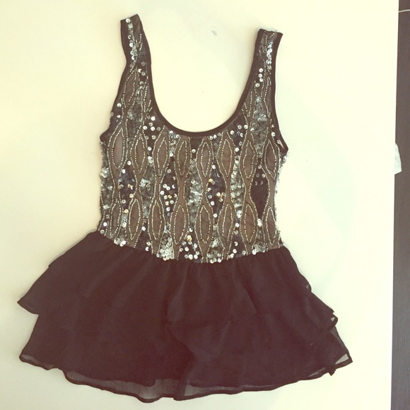 Sparkly sequined peplum party top