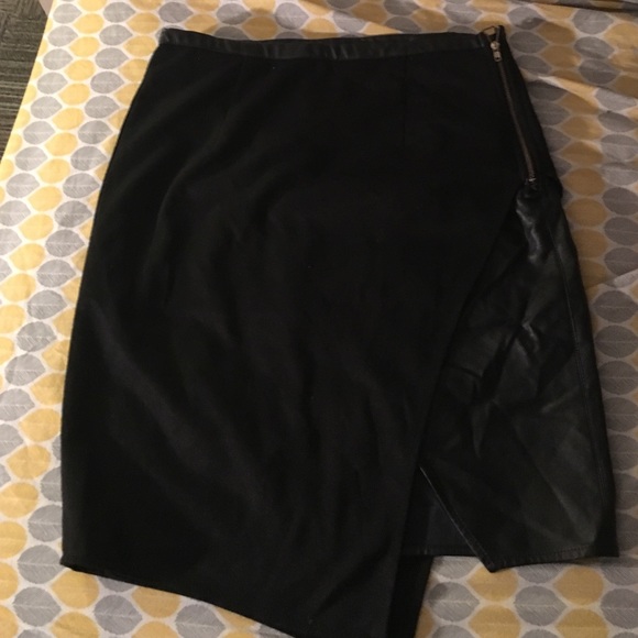 Black asymmetrical skirt with leather detailing